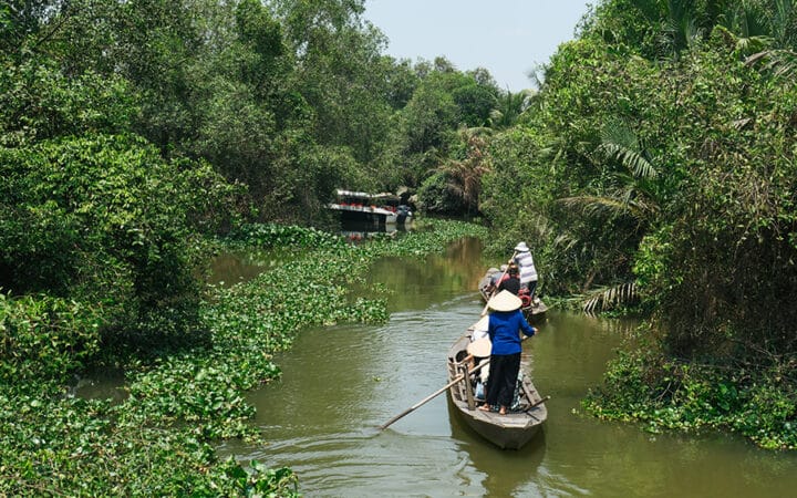 Rowing boat in the Mekong Delta