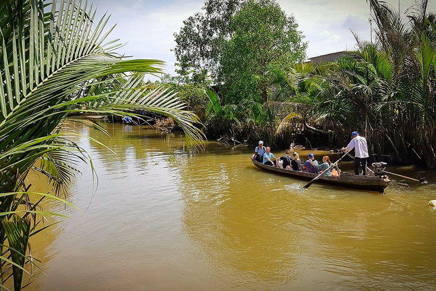 rowling boat in Mekong delta